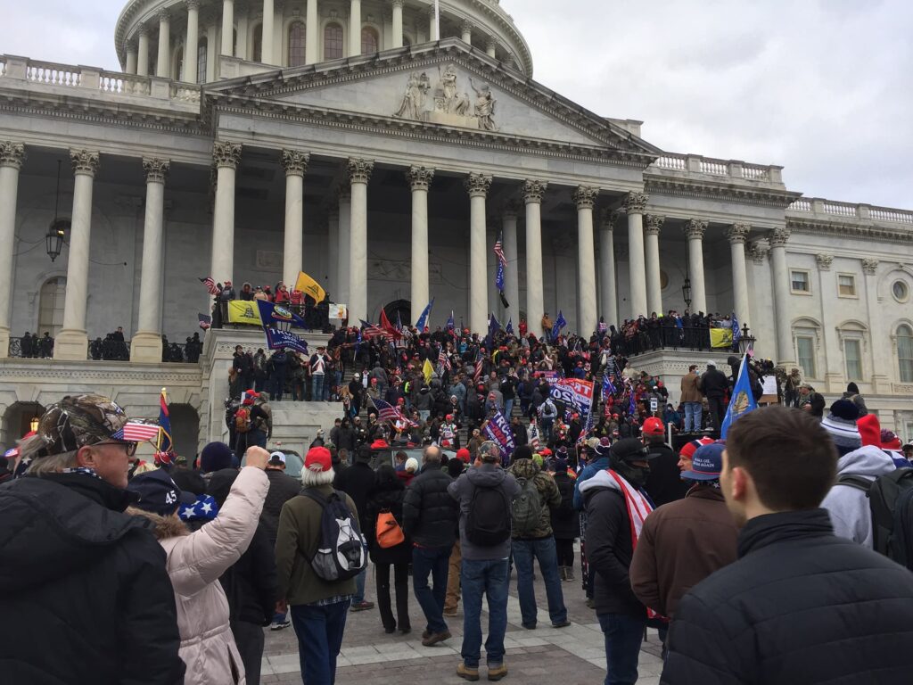 Crowd of Trump supporters marching on the US Capitol on 6 January 2021, ultimately leading the building being breached and several deaths.   Creative Commons.