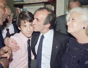 Elie Wiesel, with his wife, Marion, and son, Elisha, in New York after the announcement that he been awarded the 1986 Nobel Peace Prize.Credit...Richard Drew/Associated Press